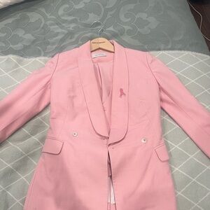 Be spoke pink 3-pieces suit.